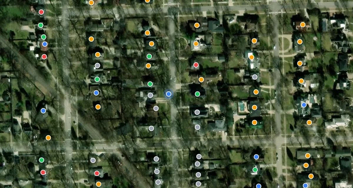The canvassing map, every door pinned by what happened at it